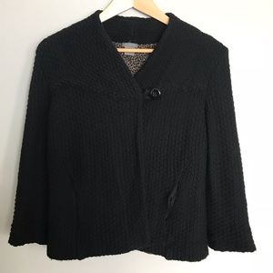 Knit swing jacket. Leopard lining
